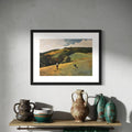 Framed landscape painting on a wall with rustic vases below
