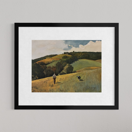 Framed painting of a landscape with a person and dog walking in a field.
