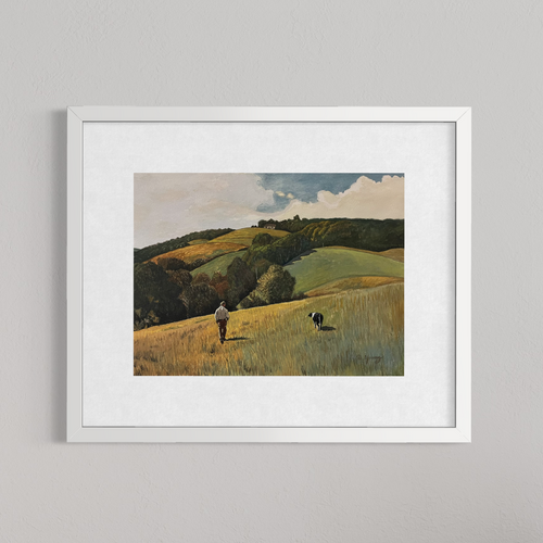 Framed painting of a landscape with a person and dog walking on a hillside.